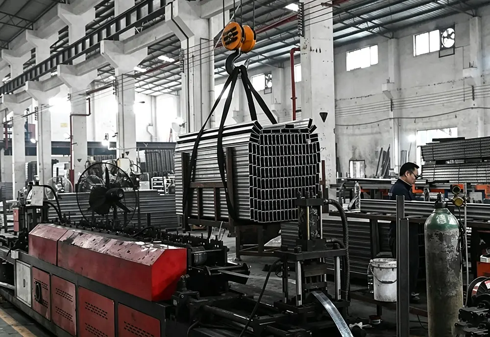 Multi-roller cold roll forming machine for structural uprights